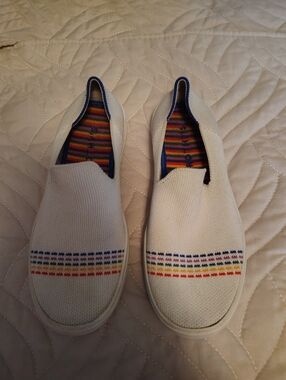 Rothy's Kids White Slip-On Sneakers with Multicolor Stripe Detail